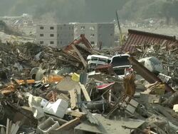 Destruction in Rikuzentakata, Iwate Prefecture, Japan on 2nd April 2011; 3 weeks after the tsunami following the Tohuku earthquake of March 2011. Stock Footage