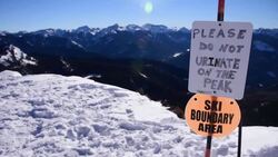 Please Do Not Urinate On the Peak Pagosa Springs Colorado Wolf Creek Alberta Peak Snow Covered Warning Sign Extreme Skiing Stock Footage