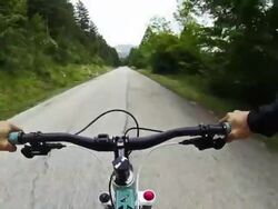 Mountain Bike Video: Long Descent on the Road Stock Footage