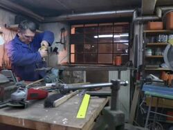 HD DOLLY: Toolmaker Drilling A Hole Stock Footage