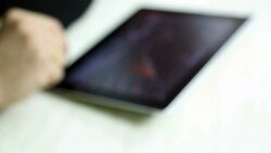 ?Zoom in businessman checking stock graph Stock Footage