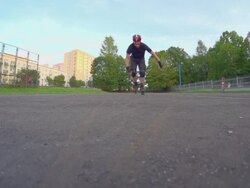 Man roller skating over film camera Stock Footage