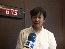 Chines artist lives on scale to study effects of f Stock Footage