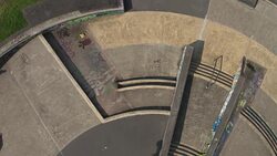 Skateboarder Jumping Stairs at Skatepark Stock Footage