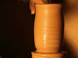 Tunisian Potter makes traditional pottery Stock Footage