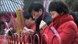 Crowds flock to the White Cloud Temple to pray for a lucky new year Instructional Video