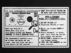 Shop owners read counterfeit money warning notice Stock Footage