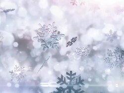 Snow crystals falling (bright) - Loop Stock Footage