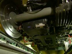 Close Up zoom-in - Electronic components cover the undercarriage of a train./Tangshan, China Stock Footage