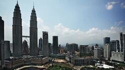 Kuala Lumpur skyline daytime featuring Petronas towers Stock Footage