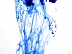 Blue ink drops on water. Stock Footage
