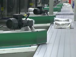 CU Shot of Newspaper bundle at newspaper printing office / Russelheim, Hesse, Germany Stock Footage