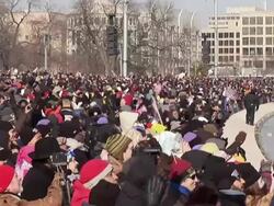 January 20, 2009 MS ZI Excited spectators cheering the introduction of Barack Obama at his inauguration on the National Mall / Washington DC / AUDIO Stock Footage