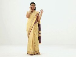 Portrait of a south Indian woman talking on a mobile phone  Stock Footage