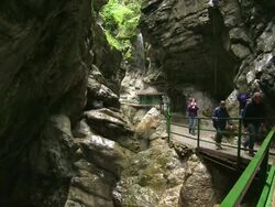 MS Tourist enjoying at canyon Breitachklamm near Allgau Alps / Oberstdorf, Bavaria, Germany Stock Footage