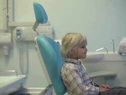 at a dentist unconcerned Stock Footage