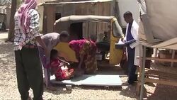 VOICED : Cloaked in dust and rags Somalis flee a looming famine News Clip