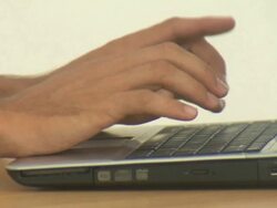 Businessman's hands typing on laptop, Cape Town South Africa Stock Footage
