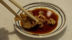 Eating fried squid japanese food Stock Footage