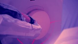 Patient being examined by MRI machine at Hospital Stock Footage