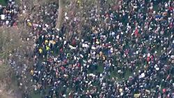 Aerial shots of the protest march through London against Donald Trump's 'Muslim ban' News Clip
