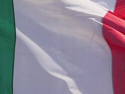CU SLO MO Shot of Italian Flag Waving in Wind / Caen, Normandy, France Stock Footage