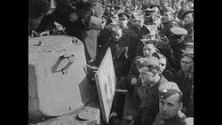 British soldiers examine damage to targets after war game demonstration in 1940s News Clip