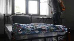 Young man traveler in the hostel Stock Footage