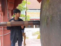 young man hit Gong Stock Footage