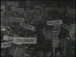 Richard and Pat Nixon wave to delegates and a large crowd at the International Amphitheater during the Republican National Convention. Stock Footage