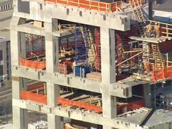 MS AERIAL TS ZO Worker working at site in city / North Carolina, United States Stock Footage