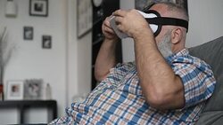 adult senior man and a virtual reality headset. graybearded man using vr glasses Stock Footage