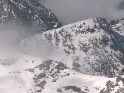 AERIAL WS POV View of clouds and snow mountains / Montana, United States Stock Footage