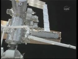 WRAP Discovery astronauts start first of three spacewalks News Clip