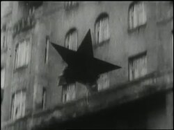 A Communist star falls from a government building during the Hungarian Revolution in Budapest, Hungary in 1956. News Clip