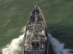 CU AERIAL ZO Shot over Customs patrol craft / Suffolk, France Stock Footage