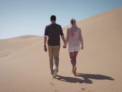 Couple in desert Stock Footage