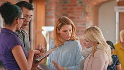 Startup team discussing project in office Stock Footage