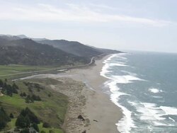 WS AERIAL View of humbug mountain state park with beach / United States Stock Footage