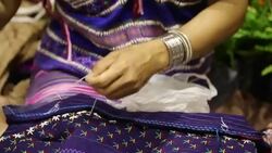 women hand sewing Stock Footage