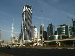 WS Traffic moving on road in cityscape / Dubai, United Arab Emirates Stock Footage