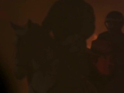 M/S riders walking, fire at background Stock Footage