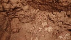 M/S cave sanctuary w/ rock paintings Stock Footage