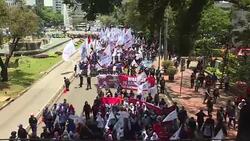 CLEAN : FILE: Controversial Indonesian tax amnesty proves divisive News Clip