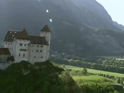 WS AERIAL TS View of village of Balzers and Gutenberg Castle in principality of Liechtenstein / Balzers, Liechtenstein, Liechtenstein Stock Footage