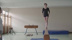 4K: Girl practicing gymnastics Stock Footage