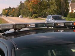 Police car on traffic patrol. Stock Footage