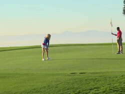 A woman playing golf. - Slow Motion Stock Footage