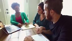 Young Caucasian couple meet with a wedding planner Stock Footage