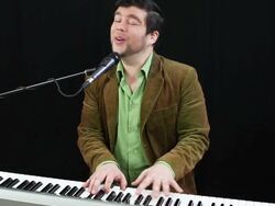 Musician sings into microphone Stock Footage